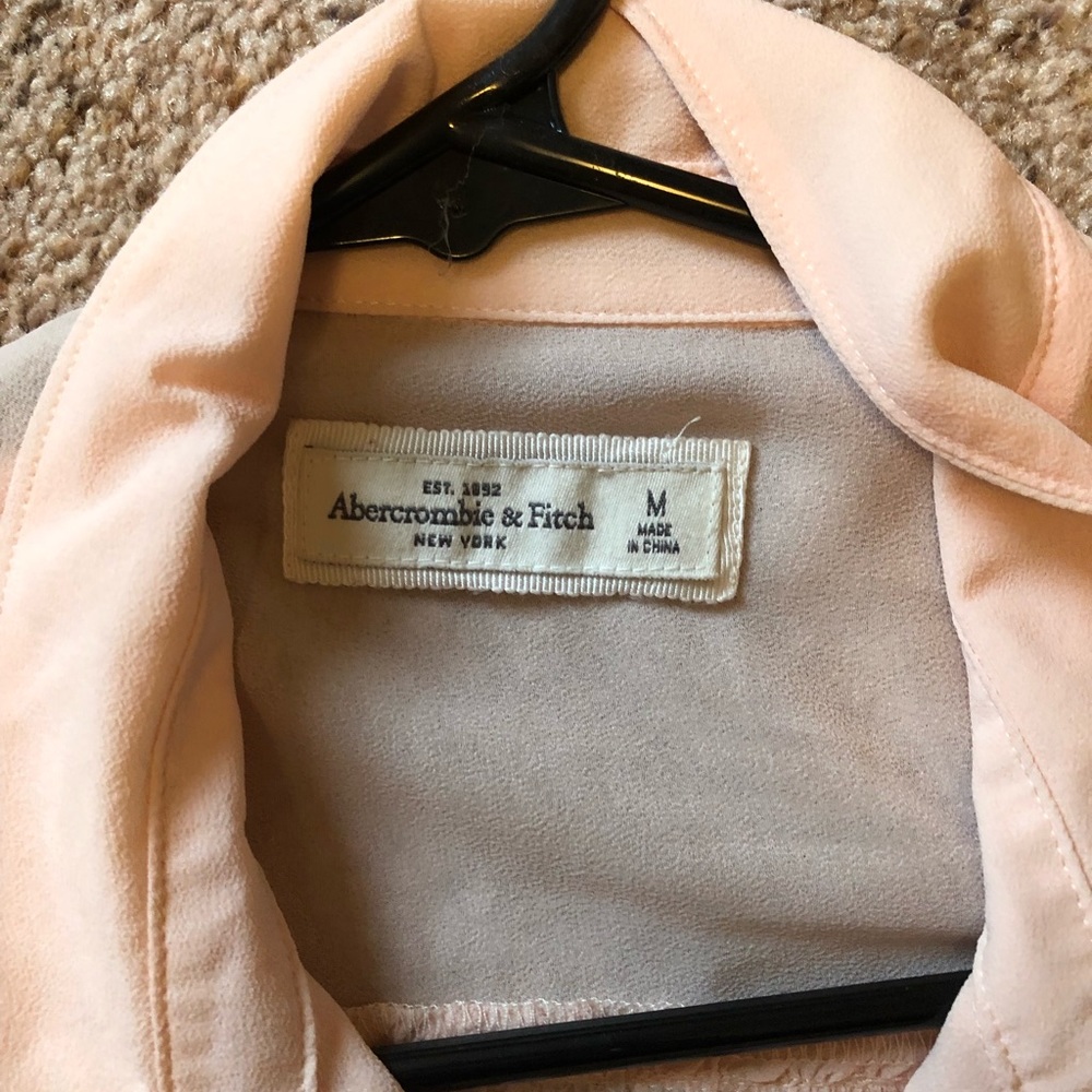 Button down. Light pink. Beaded at top